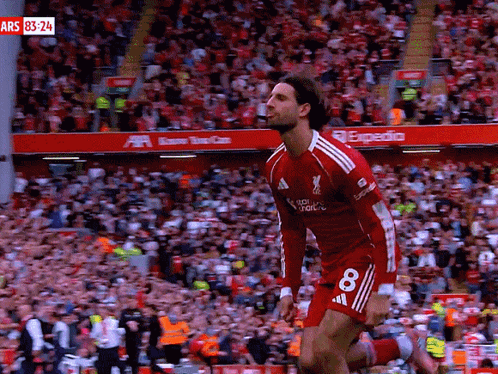 Soccer Player In Red Uniform Number 8 GIF