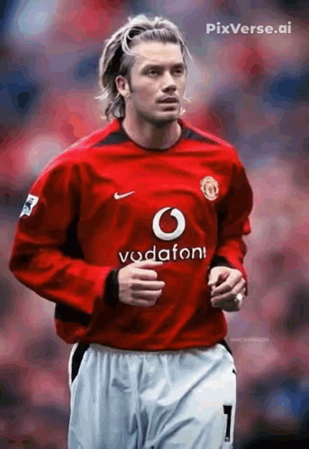Soccer Player in Red Vodafone Jersey Running
