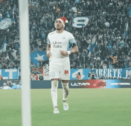 Soccer Player In Santa Hat Running GIF