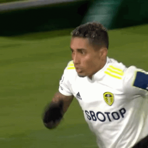 Soccer Player in Sbotop Shirt Running