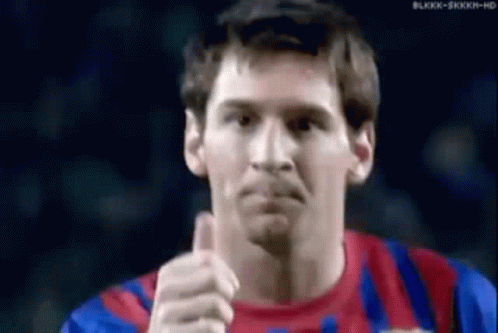 Soccer Player in Striped Jersey with FCB Logo