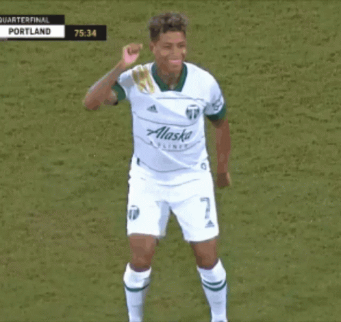 Soccer Player in White Alaska Jersey Dancing
