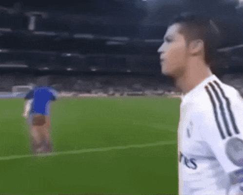 Soccer Player in White Fly Emirates Jersey
