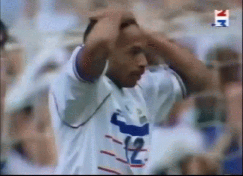 Soccer Player in White Jersey Number 2