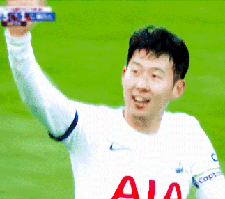 Soccer Player in White Jersey with AIA