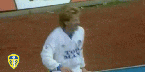 Soccer Player In White MAJ Jersey Arms Up GIF