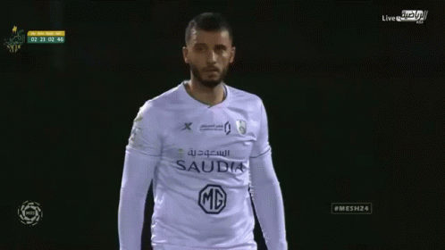 Soccer Player in White Saudia Jersey