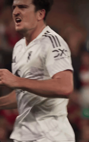 Soccer Player in White Shirt Saying Dx