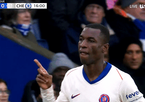 Soccer Player in White Shirt With Fever on Sleeves