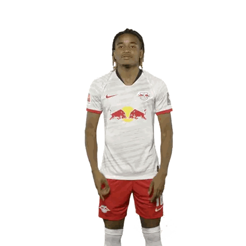 Soccer Player in White Shirt with Red Bulls