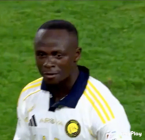Soccer Player In White Shirt With Yellow Stripes GIF