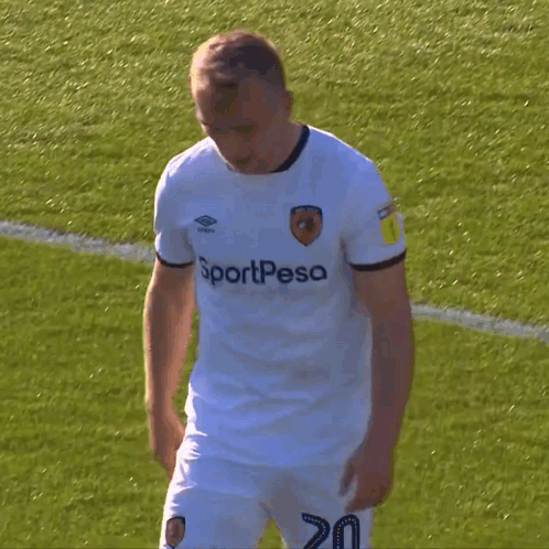 Soccer Player in White Sportpesa Shirt