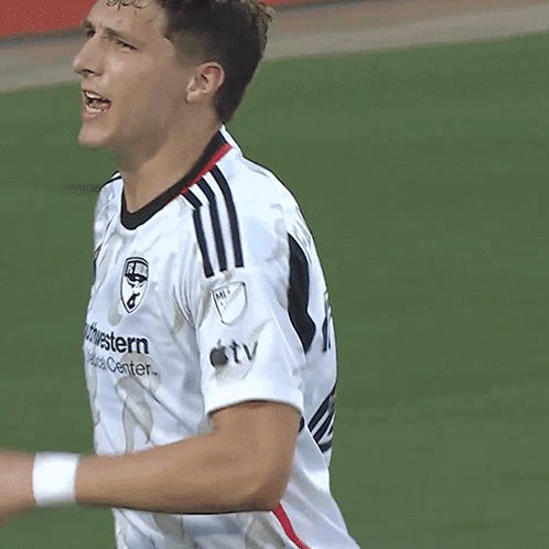Soccer Player in White Western Shirt