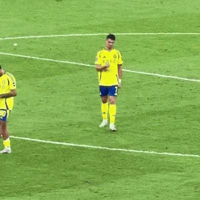 Soccer Player in Yellow Adidas Jersey