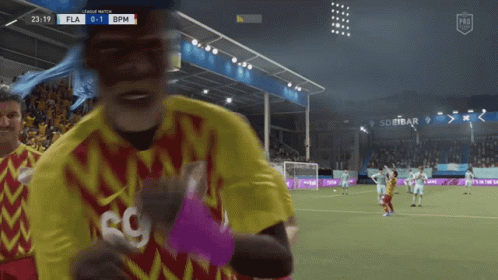 Soccer Player in Yellow and Red Jersey with SG