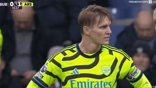 Soccer Player In Yellow Emirates Jersey GIF