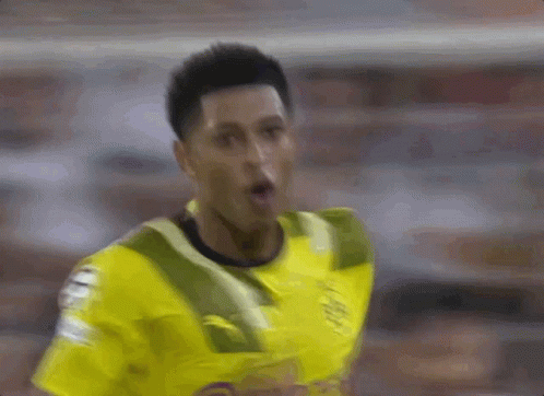 Soccer Player in Yellow Green Jersey Making Face