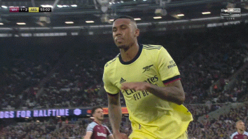 Soccer Player in Yellow Jersey Emirates