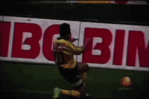 Soccer Player in Yellow Jersey Number 10