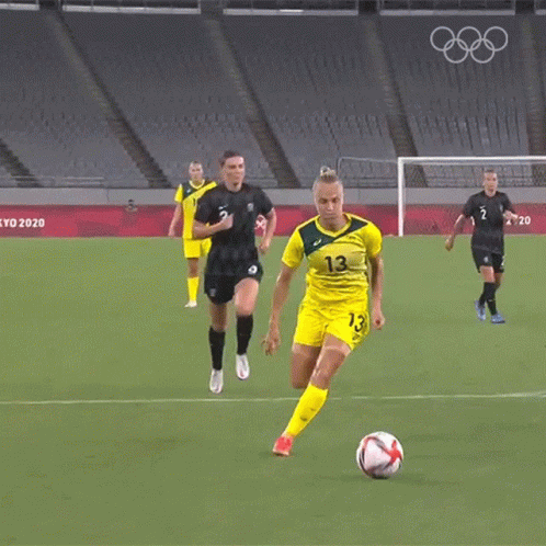 Soccer Player In Yellow Jersey Number 13 GIF