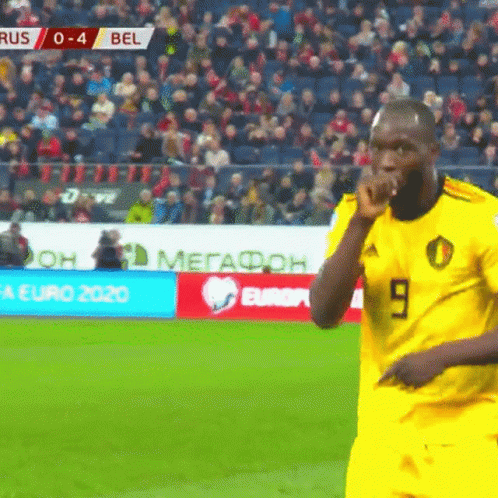 Soccer Player in Yellow Jersey Number 9