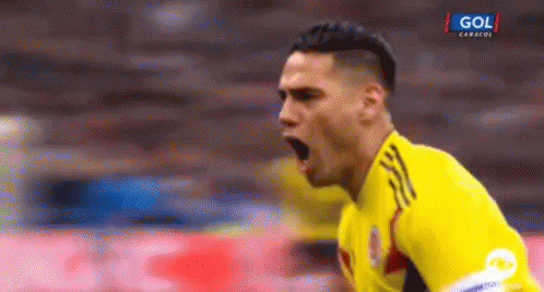 Soccer Player In Yellow Jersey Saying Gol GIF