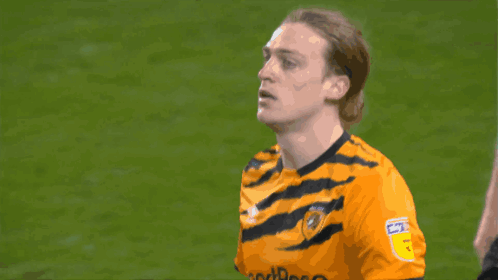 Soccer Player in Yellow Jersey Saying Sky