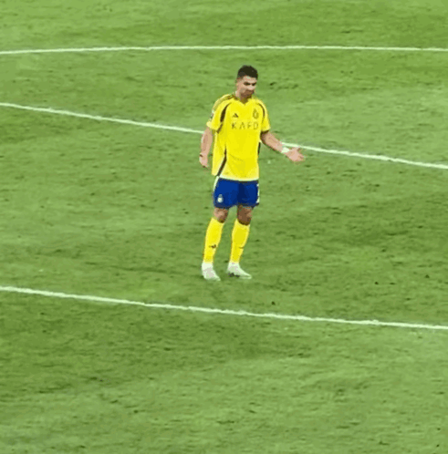 Soccer Player in Yellow Kafc Jersey