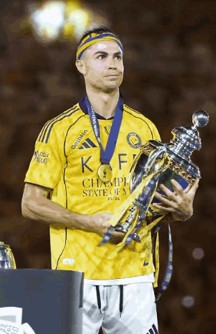 Soccer Player in Yellow Koff Shirt