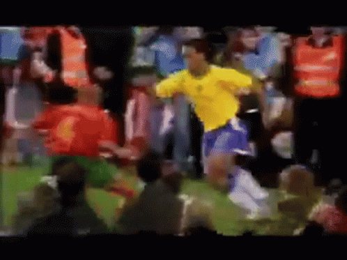 Soccer Player in Yellow Shirt