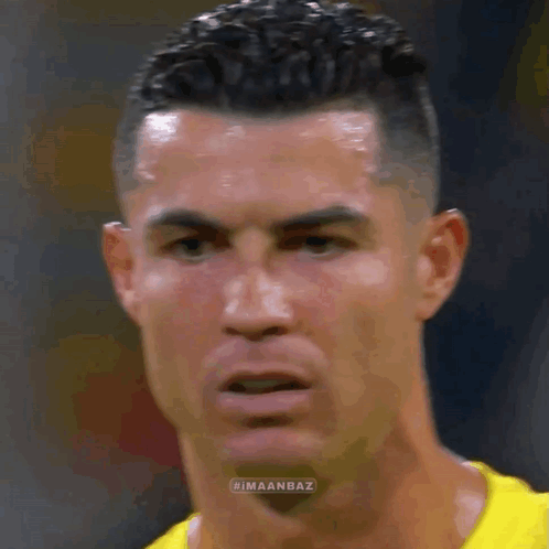 Soccer Player in Yellow Shirt Close Up