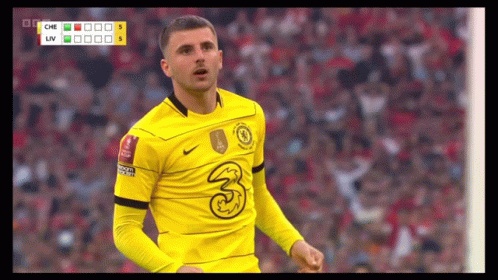 Soccer Player in Yellow Shirt Number 3