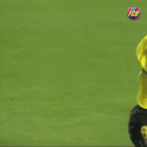 Soccer Player in Yellow Shirt Number 8 Running