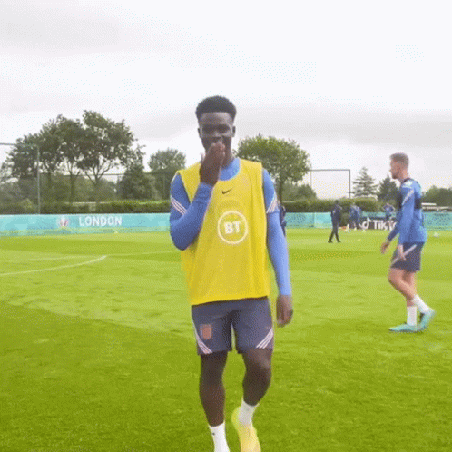 Soccer Player In Yellow Vest And Blue Shorts GIF