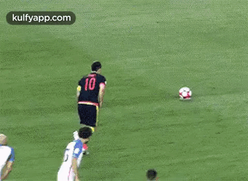 Soccer Player Kicking Ball