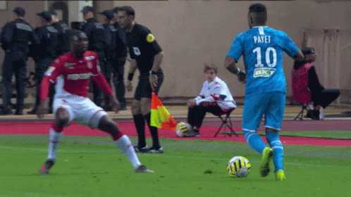 Soccer Player Kicking Ball at Kia Motors Advertisement