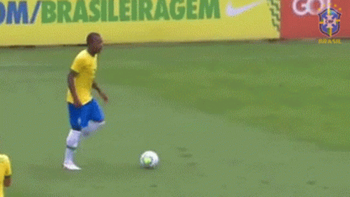 Soccer Player Kicking Ball by Brasileiragem Sign