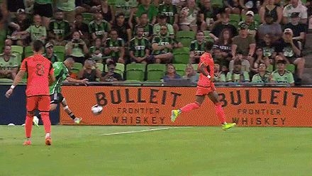 Soccer Player Kicking Ball In Front Of Bulleit Frontier Whiskey Banner GIF