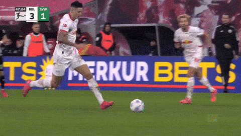 Soccer Player Kicking Ball