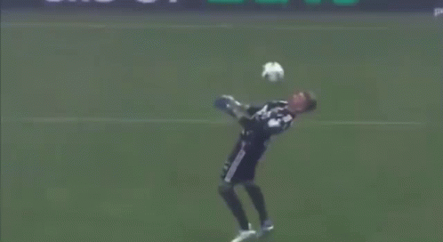 Soccer Player Kicking Ball With Yellow Circle