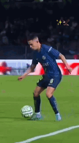Soccer Player Kicking Ball