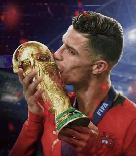 Soccer Player Kissing FIFA Trophy GIF