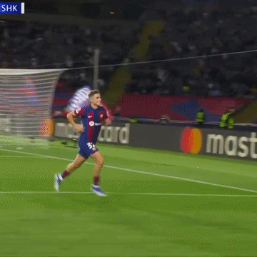 Soccer Player Kneeling in Front of Mastercard Banner