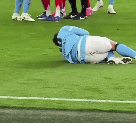 Soccer Player Laying Head On Ground GIF