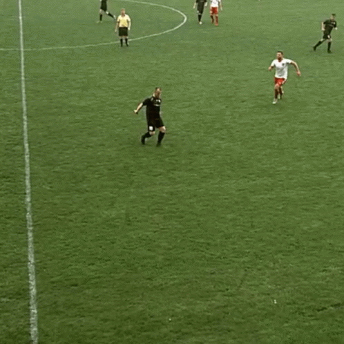 Soccer Player Laying on Ground with Flaming Knee