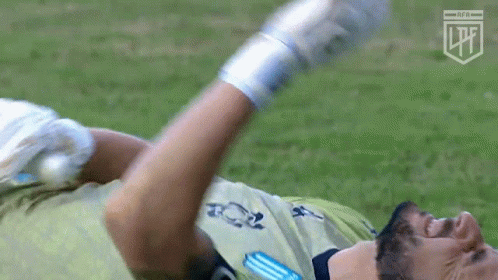 Soccer Player Lying Down Arms Outstretched Gloves GIF