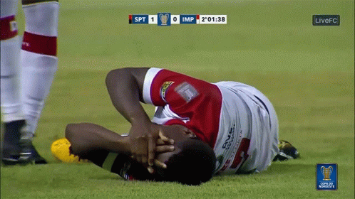 Soccer Player Lying Head In Hands SPT IMP GIF