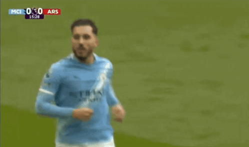 Soccer Player Lying Head On Ground GIF