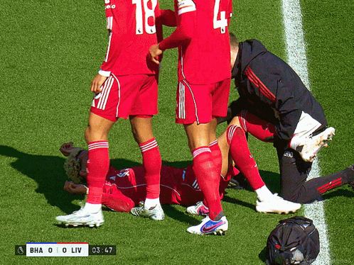 Soccer Player Lying on Field Score 0-0