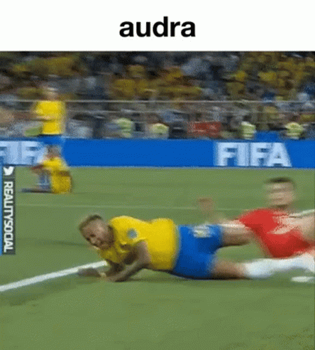Soccer Player Lying On Ground Teammate Rising GIF
